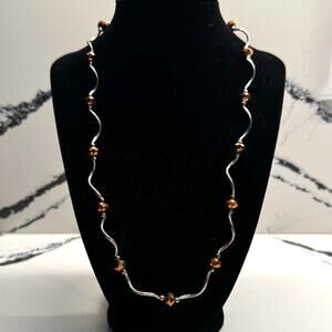 Artisan Silver Tone Wavy Necklace with Bronze Crystal Beads